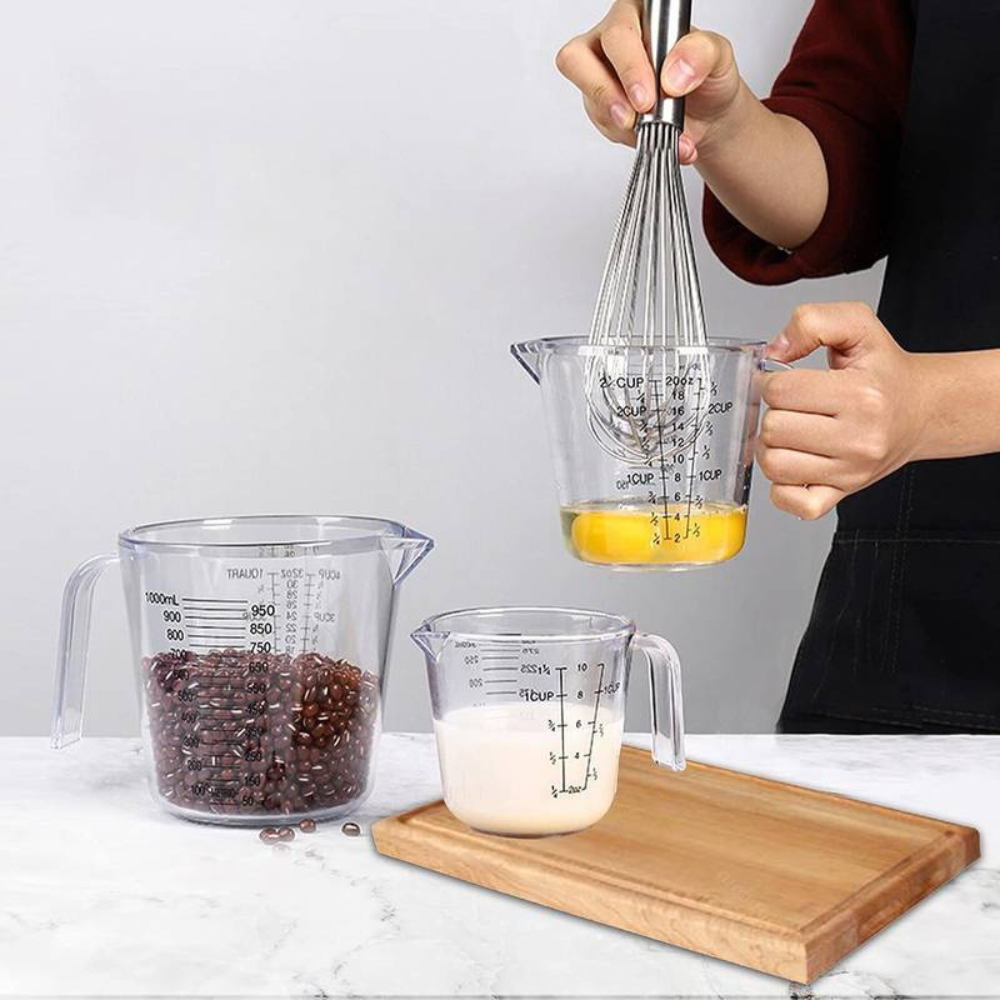3 Pcs large capacity plastic measuring cups for baking and cooking (1000 ml, 300 ml, and 600 ml) .