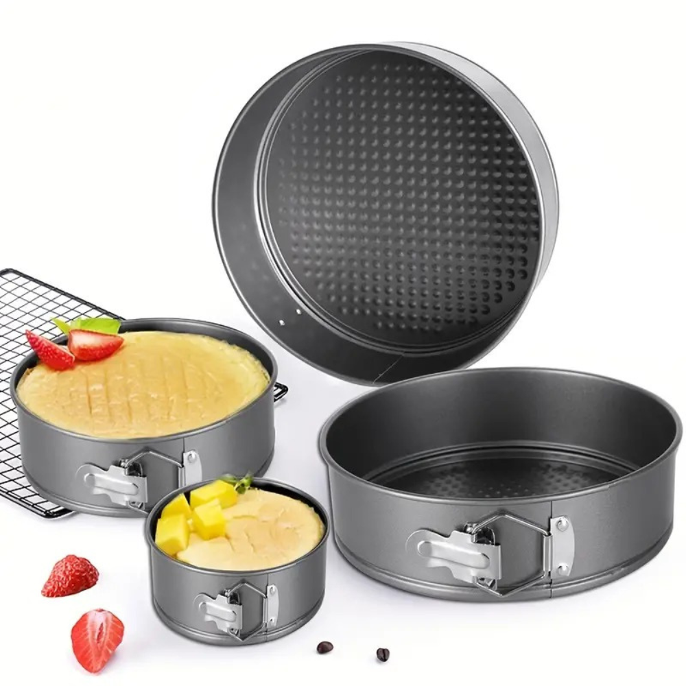 4-piece non-stick springform cake pan in round black baking tray.