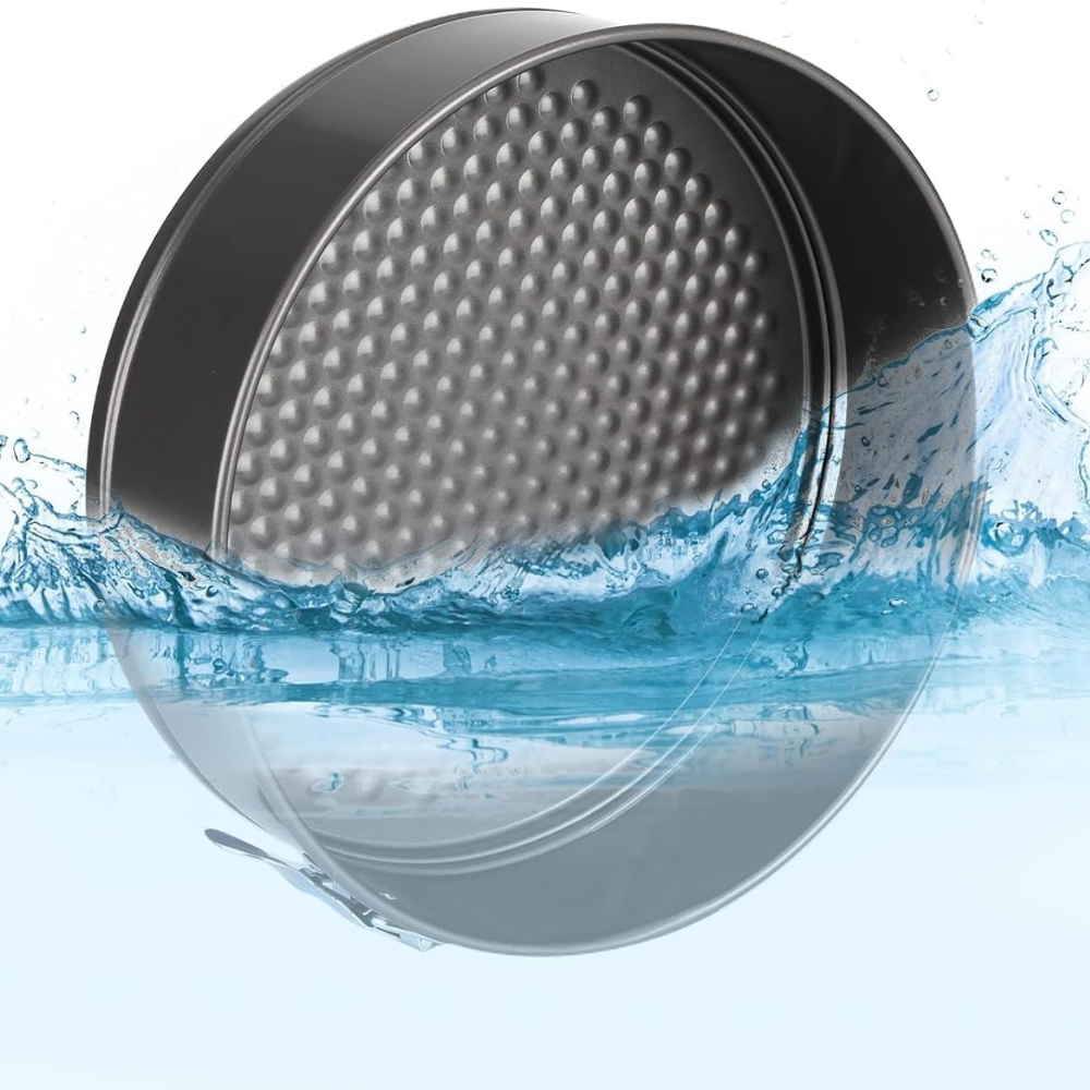 4-piece non-stick springform cake pan in round black baking tray.