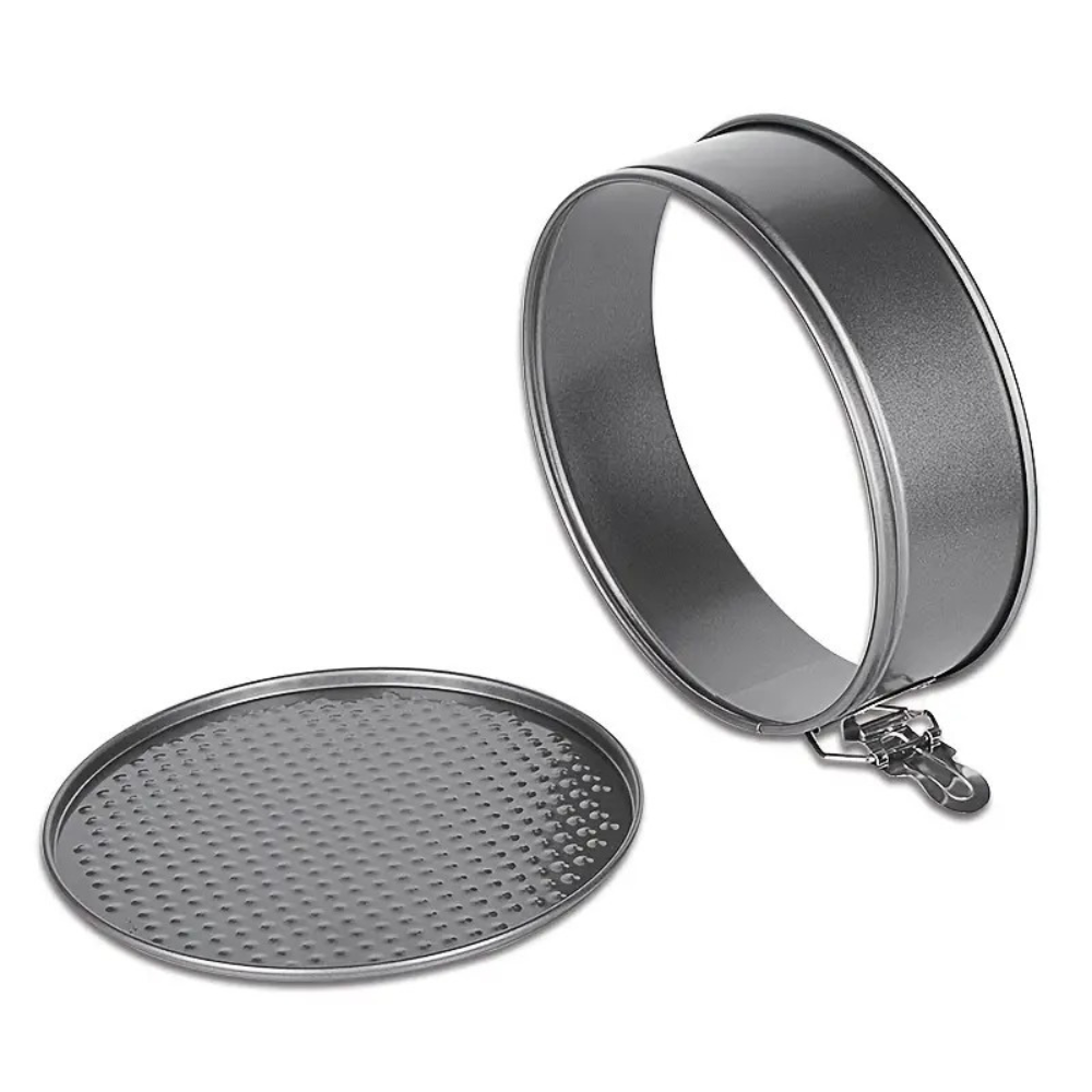 4-piece non-stick springform cake pan in round black baking tray.