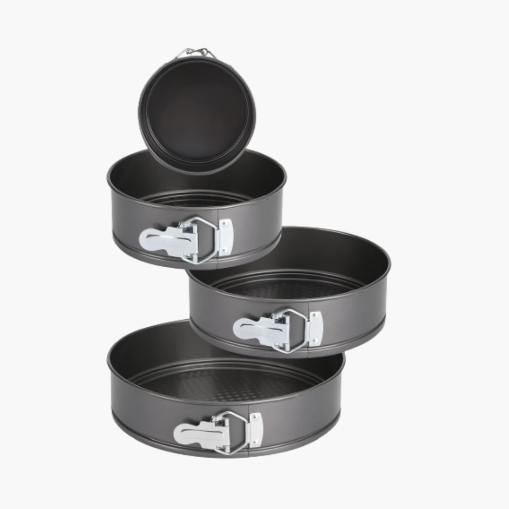 4-piece non-stick springform cake pan in round black baking tray.