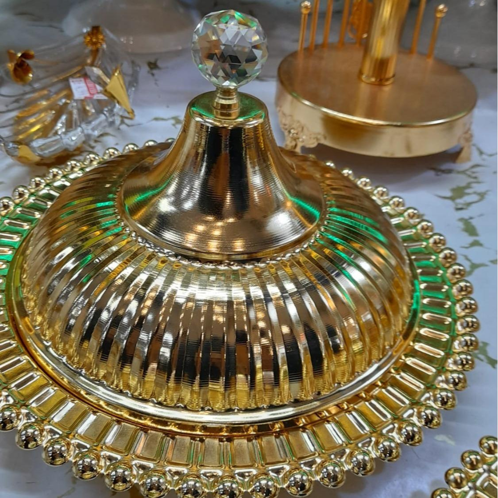 Set of 3 Moroccan-style stainless steel serving dishes with one cover made of breakfast ceramics.