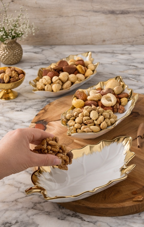 Luxury ceramic leaf serving plates set with gold rim for fruits and snacks elegant tableware
